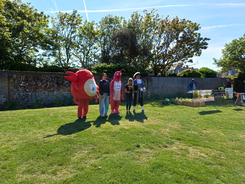Visitors at North Lodge Park in Cromer on a bright day